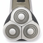 Mens Rotary Shaver Cordless Rechargeable Silver 3 Titanium Heads Trimmer New — close-up of the three rotary cutter heads