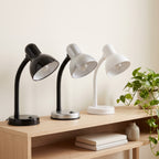 Lloytron 35W Classic Flexi desk lamps in black, silver and white on a wooden shelf