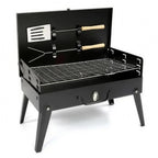 Redwood portable folding charcoal BBQ, open with grill and tools, on a white background